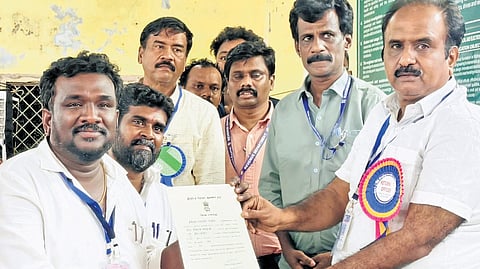 TVK’s R Seenivasa Sethupathy receiving the winning certificate from the Returning Officer in Tiruppattur Assembly constituency.