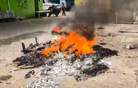 Flames billow at the TMC office following the West Bengal Assembly election result, in Asansol, Tuesday, May 5, 2026. Incidents of arson and vandalism at offices of the Trinamool Congress were reported across the state.