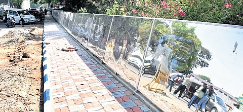 MCC installs polished stainless steel frames opposite KSRTC suburban bus stand 
to prevent public urination in Mysuru on Wednesday.