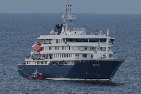 The MV Hondius cruise ship is anchored at a port in Praia, Cape Verde, Wednesday, May 6, 2026.