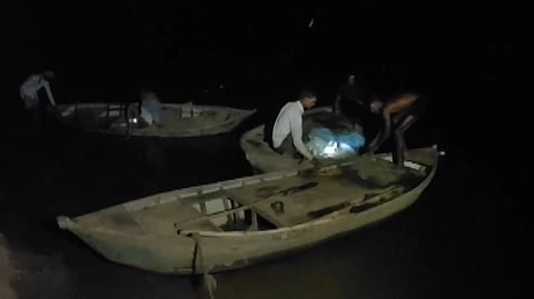 A boat capsized in the Yamuna River in Hamirpur, Uttar Pradesh, on Wednesday.
