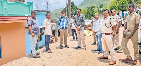 Sub-collector Anup Panda and other officials at Manikpur village.