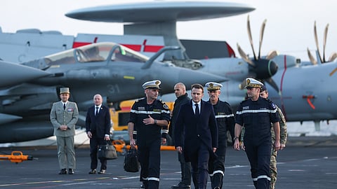 French President Emmanuel Macron, centre-right, visits the French aircraft carrier Charles de Gaulle during his visit to Cyprus, March 9, 2026. 