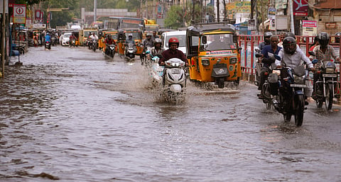  Following rainfall last night, rainwater seen stagnant in simmakkal to Periyar road making it difficult for the people to use the road in Madurai on Thursday.
