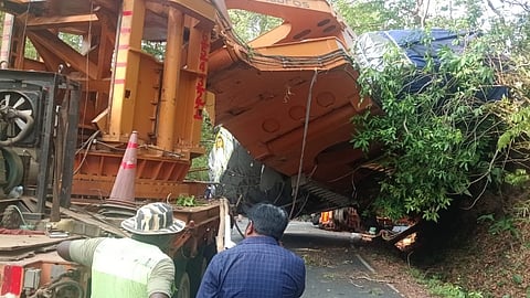 The truck which overturned at Mallapur in Uttara Kannada on Thursday.