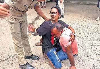 Family members of Soumya Ranjan Swain break down outside Capital Hospital mortuary in Bhubaneswar.