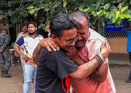Family members of Soumya Ranjan Swain break down outside Capital Hospital mortuary in Bhubaneswar.