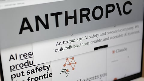 Pages from the Anthropic website and the company's logo are displayed on a computer screen in New York on Feb. 26, 2026. 
