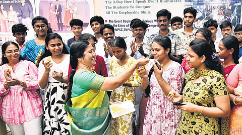 Class 12 students celebrate at Everwin Higher Secondary School in Chennai after the board exam results were declared on Friday. 