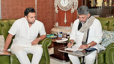 Mysuru-Kodagu MP Yaduveer Wadiyar with Deputy Chief Minister DK Shivakumar in Bengaluru, on Friday.