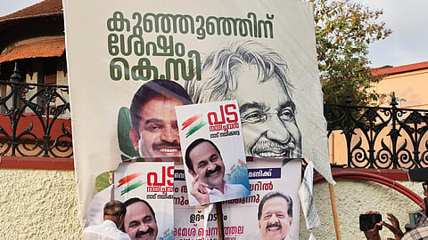 Supporters of rival Congress camps put up posters and flex boards across Kerala as lobbying intensifies ahead of the party high command’s decision on the next chief minister.