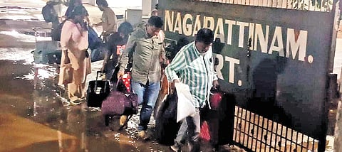 Passengers leave from Nagapattinam port after the ship was brought back to the harbour on Friday night.