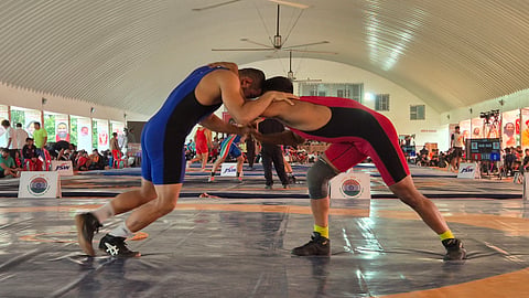 Freestyle wrestlers  in action at the Senior Open Ranking Tournament on Sunday