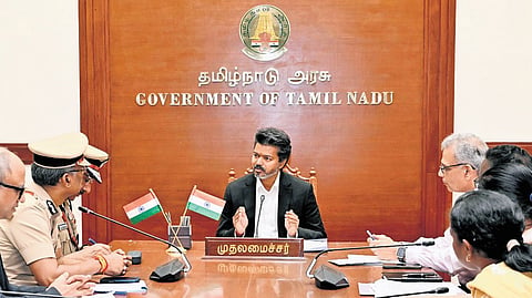 CM Vijay chairing a high-level meeting with senior bureaucrats and police officials to review law and order situation.