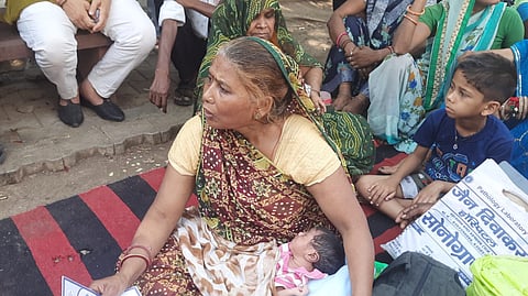 Families of deceased victims stage a protest outside the hospital in Kota on Monday, May 11, 2026.