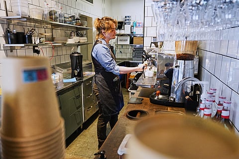 Barista Kajetan Grzelczak makes a coffee at Andon Café at the Vasastan neighborhood in Stockholm, Sweden, Tuesday, May 5, 2026. 