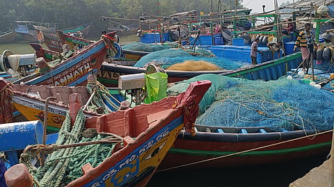 Fishing boats anchored at Kharinashi jetty in Kendrapara.