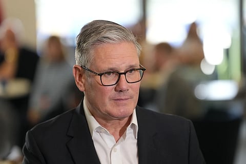 British Prime Minister Keir Starmer speaking to the media after meeting  Labour Party members during a visit to AFC Wimbledon in South London, Saturday, May 9, 2026.