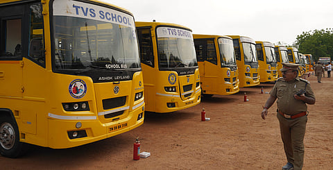 Officials inspecting the condition of school buses at  AR Ground in Madurai.