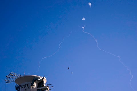 Israel's Iron Dome anti-missile system fires to intercept as air raid sirens sound in Tel Aviv, on Oct. 23, 2024. 
