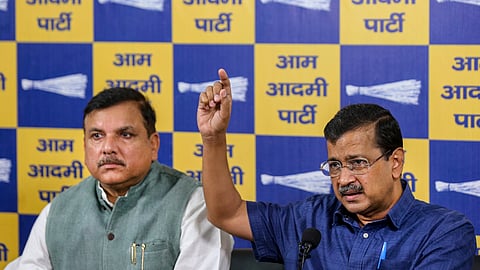AAP National Convener Arvind Kejriwal along with party leader Sanjay Singh address a press conference, at party headquarters, in New Delhi, Wednesday, May 13, 2026.