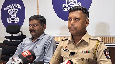 Deputy Commissioner of Police Kiran Kumar Chavan addresses a press conference regarding the arrest of an accused in the alleged NEET-UG 2026 paper leak case, in Nashik, Tuesday, May 12, 2026. 