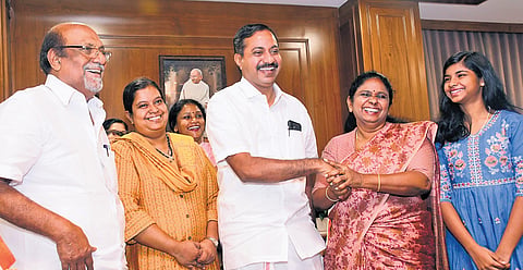 Deepak Joy, who was elected MLA from Tripunithura in the assembly election, shakes hands with Mayor V K Mini after resigning from the  post on Wednesday .