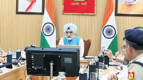 L-G Taranjit Singh Sandhu during the review meeting with officials on Wednesday.