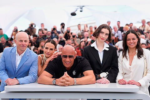 Producer Neal H. Moritz, from left, Jordana Brewster, Vin Diesel, Meadow Walker and Michelle Rodriguez pose for photographers at the photo call for the 25th anniversary of the film 'The Fast and the Furious' during the 79th international film festival, Cannes, southern France, Wednesday, May 13, 2026. 