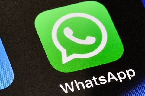 A WhatsApp icon is displayed on an iPhone, Nov. 15, 2018, in Gelsenkirchen, Germany. 
