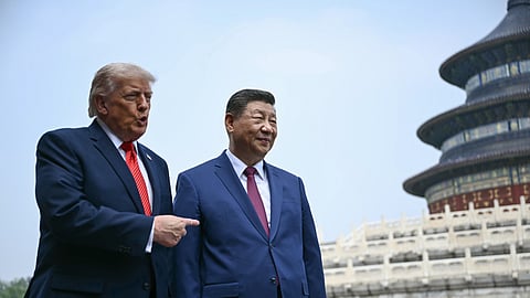 China's President Xi Jinping, right, and US President Donald Trump visit the Temple of Heaven in Beijing on Thursday, May 14, 2026.