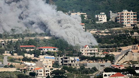 Smoke rises from the site of an Israeli airstrike that targeted the southern Lebanese village of Jarjouaa on May 13, 2026.