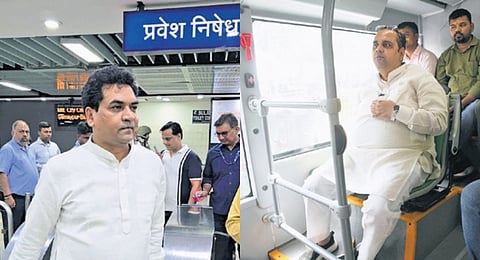 Ministers Kapil Mishra and Pankaj Kumar (right) travel on public transport.