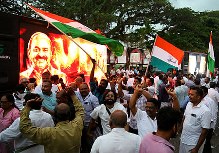 Congress workers celebrate across Kochi following the election of V D Satheesan as chief minister