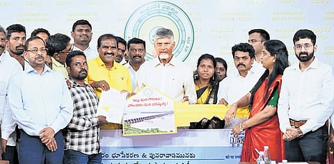 Chief Minister Nara Chandrababu Naidu interacting with families displaced by the Polavaram project, at his camp office in Undavalli on Friday