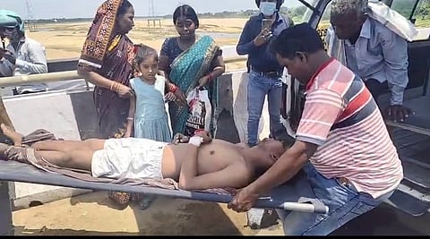 Deceased patient being shifted to another ambulance on Kathajodi bridge on the outskirts of Cuttack