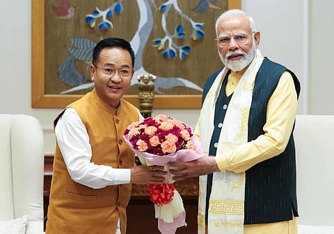 Sikkim Chief Minister Prem Singh Tamang (L) with Prime Minister Narendra Modi.