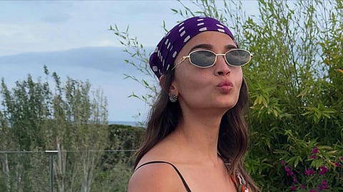 Alia Bhatt gives a bohemian twist to her fit for a Spanish coast wedding
