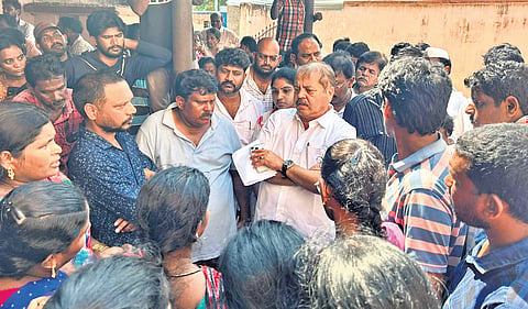 Kakinada Rural MLA PV Rao consoles the family members of the victims.