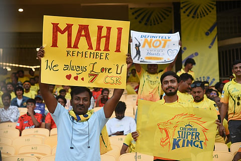 CSK fans hold placards for MS Dhoni