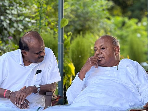 H D Deve Gowda (right) with his son H D Kumaraswamy. 