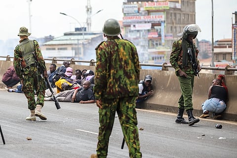 Kenyan anti-riot Police confront protesters during a public transport strike over fuel prices in Nairobi, Kenya, Monday, May 18, 2026
