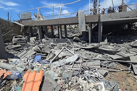 The aftermath of an Israeli airstrike is seen in the village of Maʿshūq in the district of Tyre, southern Lebanon, on May 19, 2026.