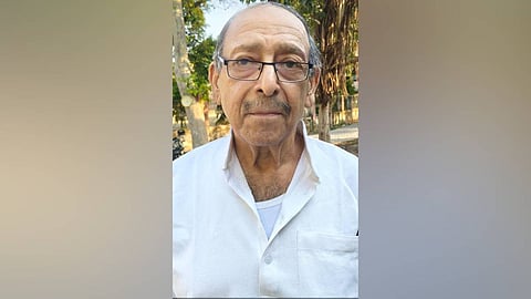 70-yr old Ashok Bahar stepping out of the NEET exam centre at Lucknow Montessori College at Purana Quila in  Lucknow on May 3 after completing his exam .