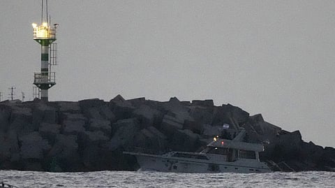 Israeli naval forces sail a confiscated Gaza-bound flotilla boat into Israel's Ashdod port after intercepting the vessel on the Mediterranean Sea, Tuesday, May 19, 2026.