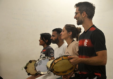 Students playing the pandeiro