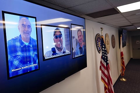 Photos of the three victims at the Islamic Center of San Diego are displayed after a news conference in San Diego, Calif., Tuesday, May 19, 2026.