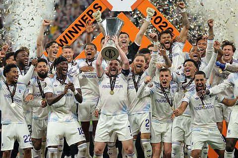 Aston Villa players celebrate as they win the Europa League final soccer match between Freiburg and Aston Villa in Istanbul.
