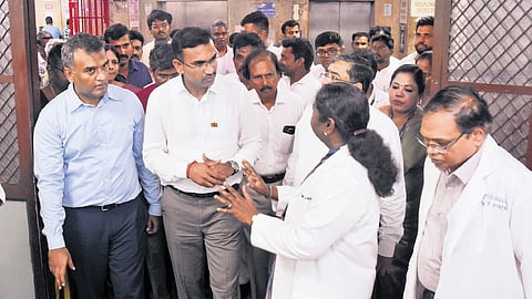 Minister Arunraj, accompanied by Health Secretary Darez Ahamed, reviews emergency services at Rajiv Gandhi Government General Hospital on Wednesday.