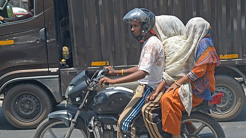 People using scarf to cover face for protection against sun as Temperature increases to 44 degree on Wednesday.
